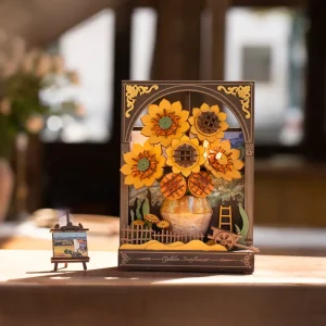 Puzzle 3D en bois Rowood Golden Sunflower TH002 représentant un bouquet de tournesols dans un vase avec un chevalet, une charrette et un éclairage LED.