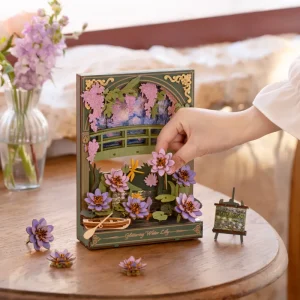 Puzzle 3D en bois Rowood Glittering Water Lily TH001 représentant des nénuphars colorés, une barque et un pont de jardin avec éclairage LED.