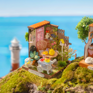 Rolife Fancy Tea Yard DS038 – maison miniature DIY représentant un petit jardin fleuri avec table à thé, plantes, desserts et chariot.