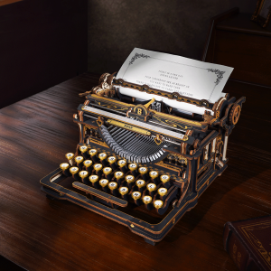ROKR Machine à écrire mécanique LK703B en bois, puzzle 3D vintage noir et or avec clavier QWERTY, engrenages et mécanisme de frappe fonctionnel.