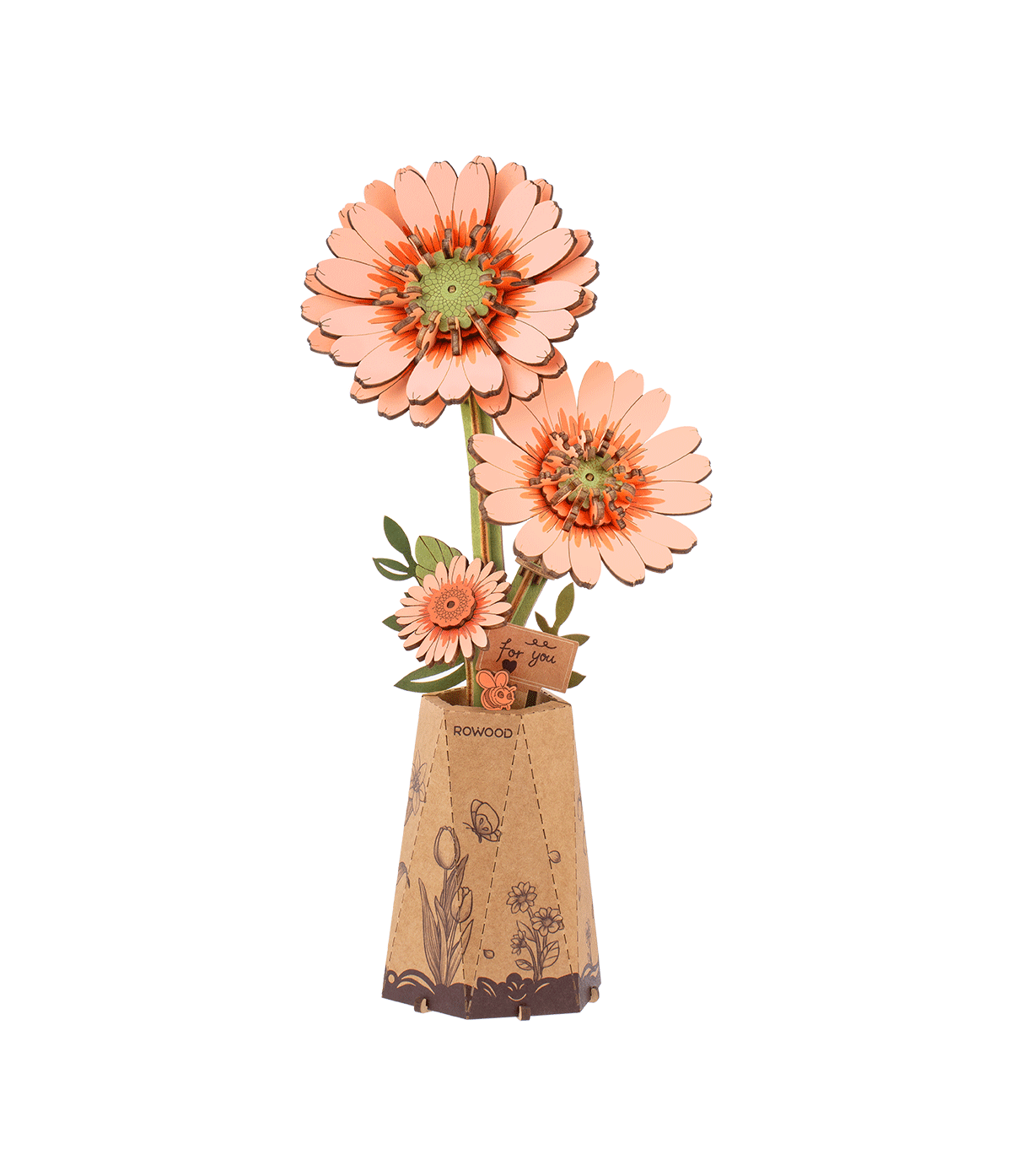 Puzzle 3D en bois Rowood Light Orange Gerbera TW111 représentant trois fleurs de gerbera orange clair avec leurs feuilles vertes dans un vase décoratif en papier.