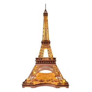 Maquette 3D en bois Rolife TGL01 représentant la Tour Eiffel illuminée avec des LED chaleureuses et une carte de Paris à sa base.