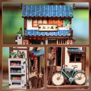 Magnet miniature Ramen Shop en bois représentant un restaurant japonais traditionnel avec toit bleu, lanternes rouges et petits accessoires détaillés.